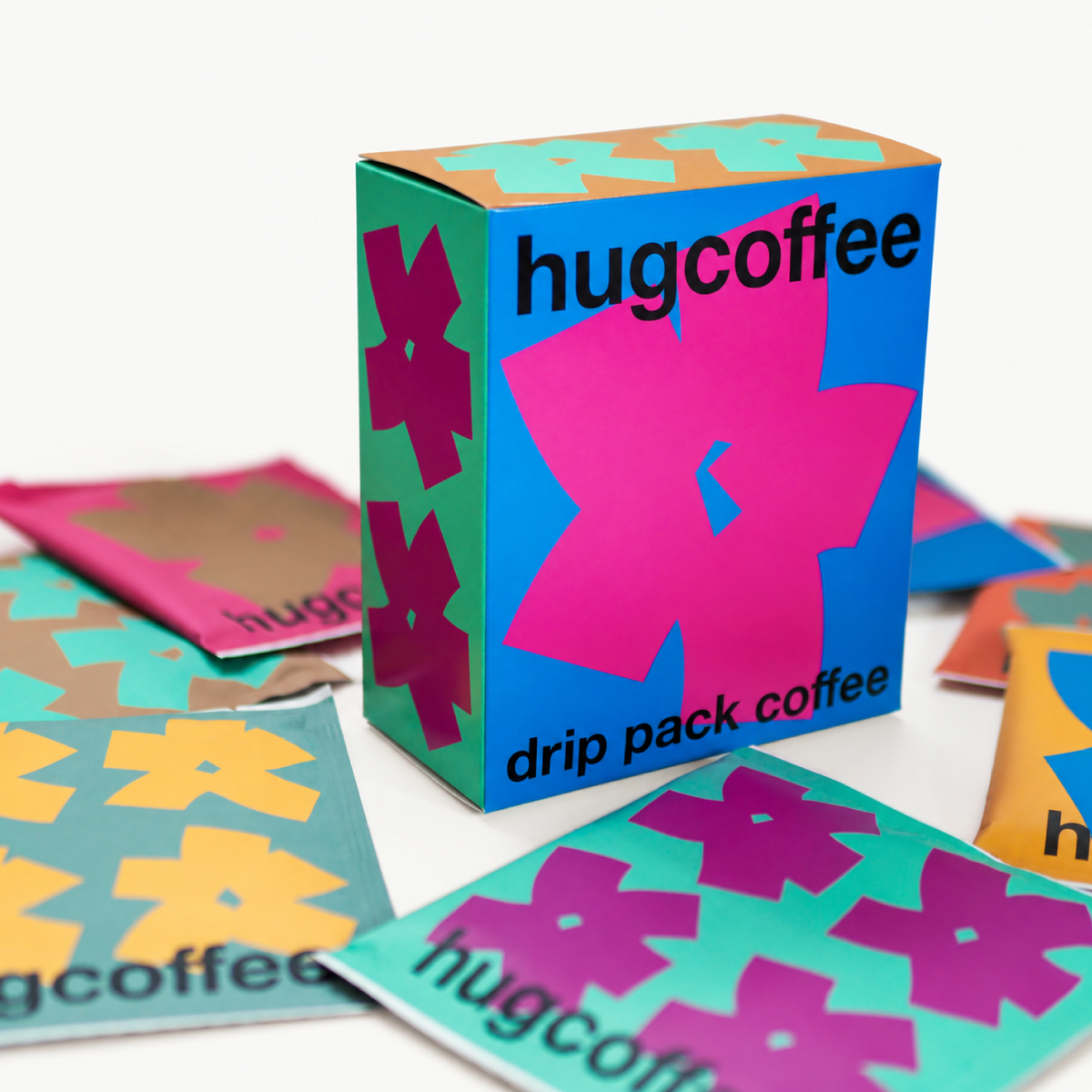 hugcoffeeのスペシャルティコーヒー、ハグブレンドのクイックコーヒードリップ。7種類のカラフルなフラワーデザインの個包装と専用ボックス。